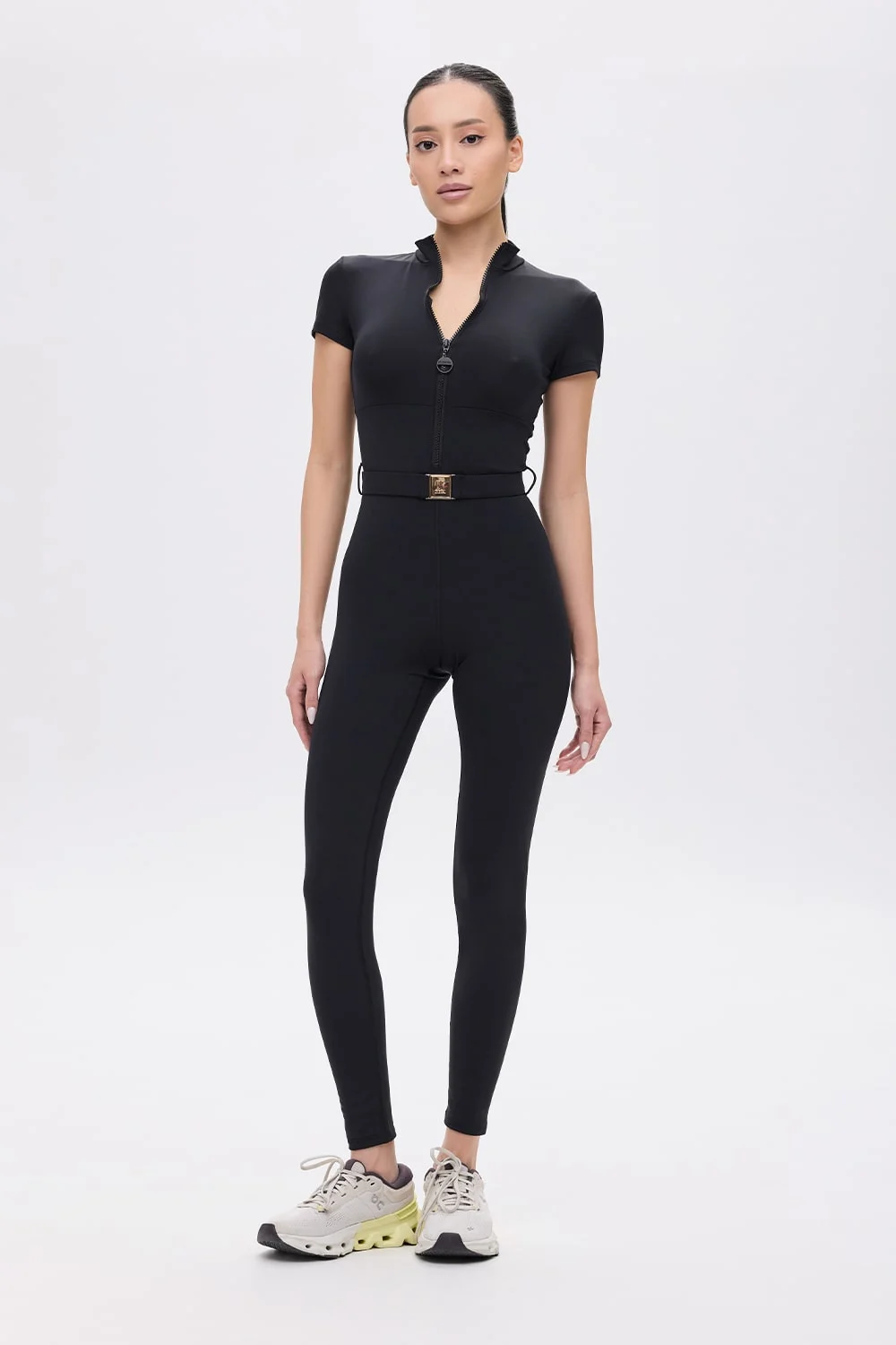 dominant-gold-short-sleeve-jumpsuit-1-min_1 Одежда для девушек. Комбінезон Dominant Gold короткий рукав. Комбинезон Dominant Gold короткий рукав.